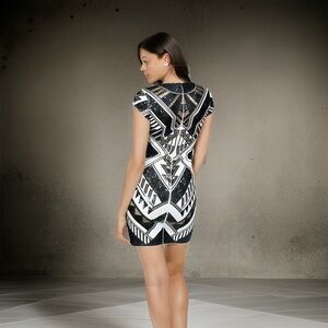 Monochrome Magic: Mini‎ Black & White Sequin Dress